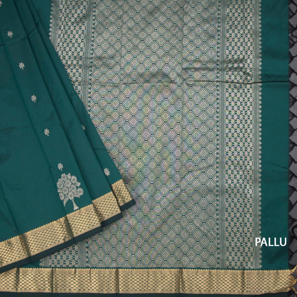 Semi Silk Dark Green Saree With Floral And Tree Design And Zari Border