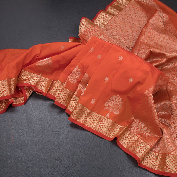 Semi Silk Fanta Orange Saree With Floral And Tree Design And Zari Border