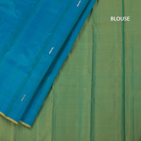 Peacock Blue Borderless Silk Saree With Zari Buttas