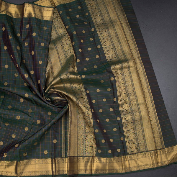 Bottle Green Checked Silk Saree With Peacock And Chakra Buttas And Zari Border