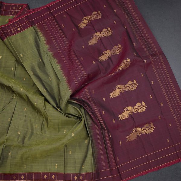 Olive Green Silk Saree With Zari Buttas And Zari Checked border