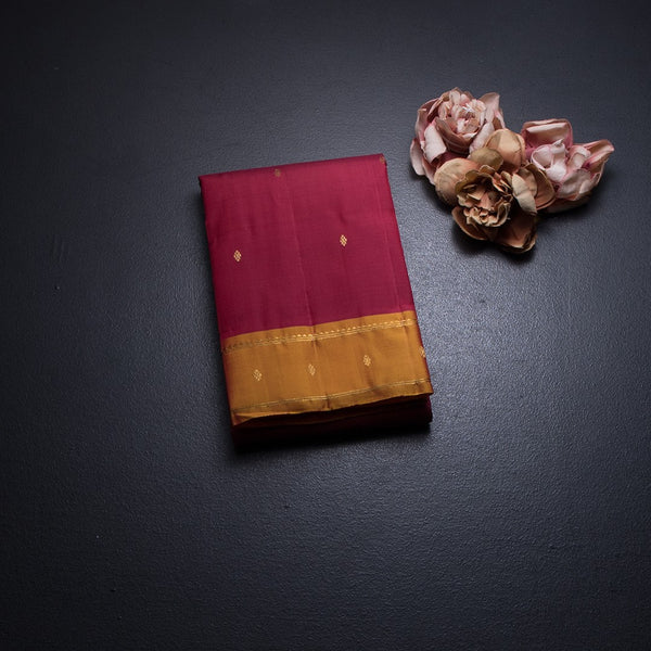 Maroon Silk Saree With Zari Buttas And Yellow Border