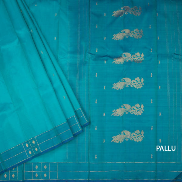 Peacock Blue Silk Saree With Zari Buttas And Zari Checked Border