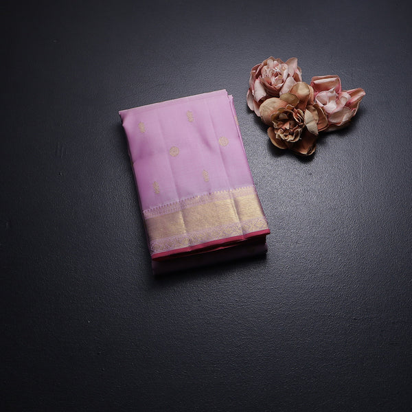 Light Pink Silk Saree With Chakra Buttas And Gold Zari Border