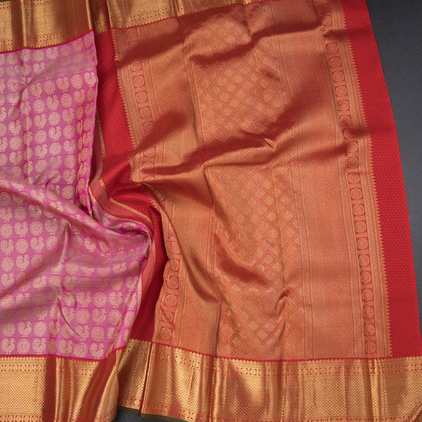 Taffy Pink Silk Saree Peacock And Chakra Buttas And Gold Zari Border