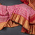 Taffy Pink Silk Saree Peacock And Chakra Buttas And Gold Zari Border