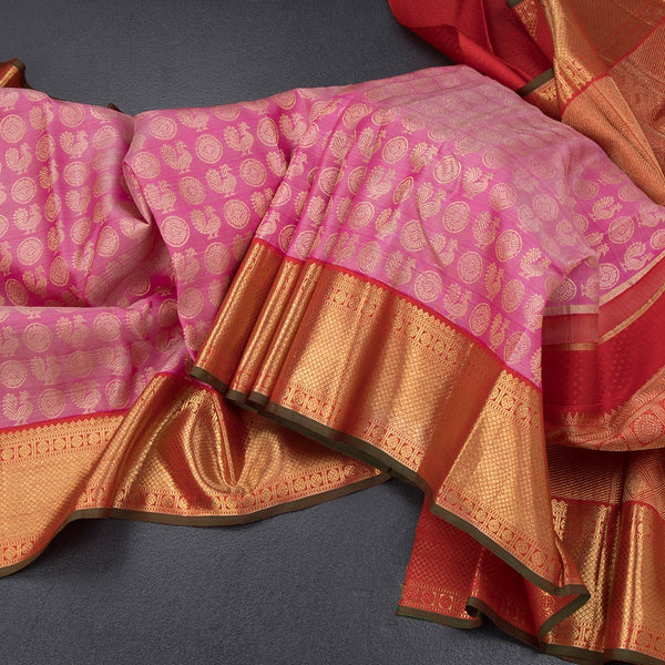 Taffy Pink Silk Saree Peacock And Chakra Buttas And Gold Zari Border