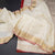Cream Silk Saree With Chakra Buttas And Rettapet Border