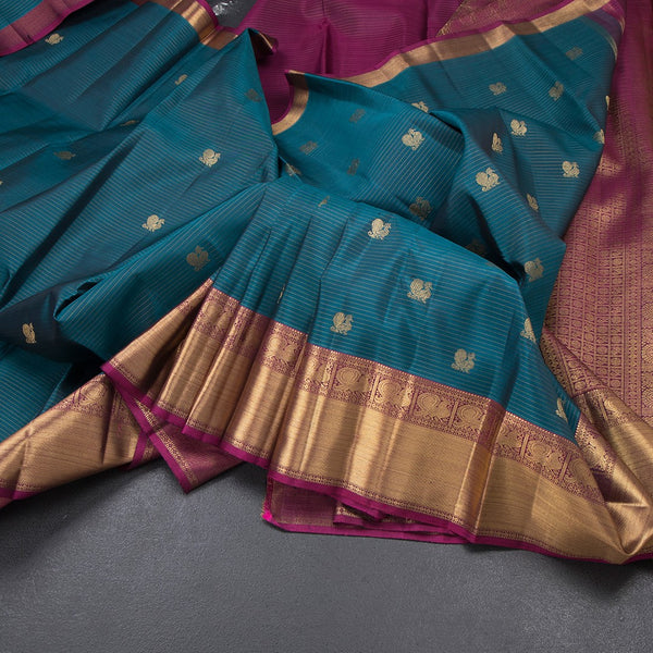 Peacock Blue Stripes Silk Saree With Peacock Design And Gold Zari Border