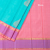 Turquoise Blue Silk Saree With Peacock Design And Thread Border