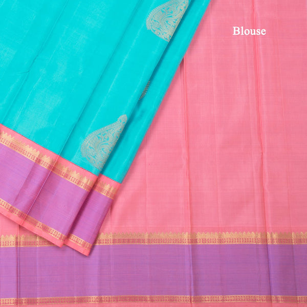 Turquoise Blue Silk Saree With Peacock Design And Thread Border