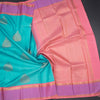 Turquoise Blue Silk Saree With Peacock Design And Thread Border
