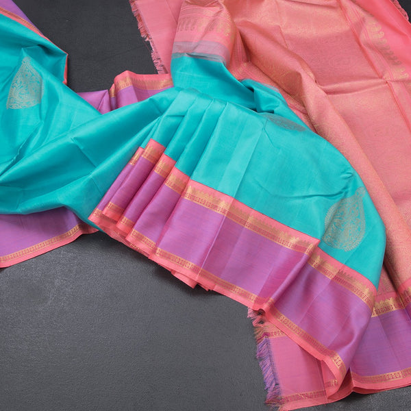 Turquoise Blue Silk Saree With Peacock Design And Thread Border