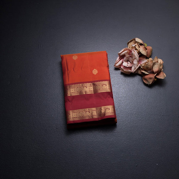 Orange Silk Saree With Stripes Design And Rettapet Border