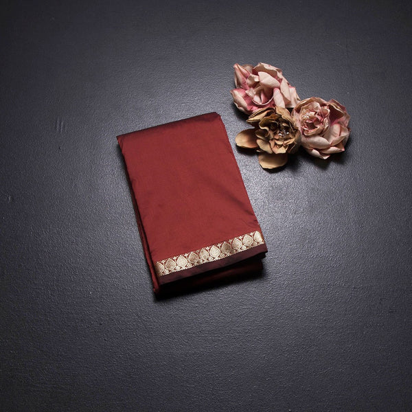 KSSMLSR42091-1-Semi-Silk-Maroon-Plain-Saree-And-Zari-Border-02-fold