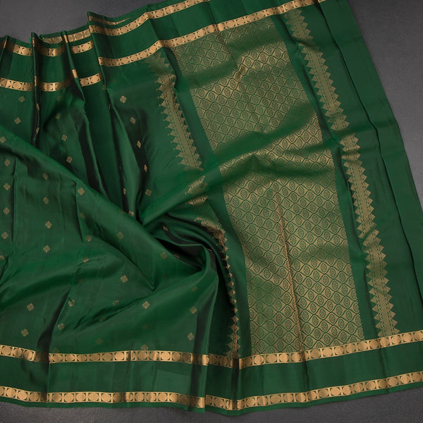 KSSMLSR42472-4-Dark-Green-Silk-Saree-With-Zari-Buttas-And-Rettapet-Border-crush