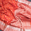 Reddish Orange Soft Silk Saree With Peacock And Mango Buttas In Silver Zari And Animal Motif On Border