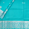 Turquoise Blue Soft Silk Saree With Chakra Buttas And Floral Silver Zari Border