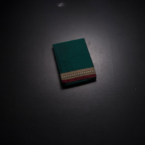 KSSRSSR42422-1-Dharwad-Cotton-Dark-Green-Plain-Saree-And-Thread-Border-02-fold