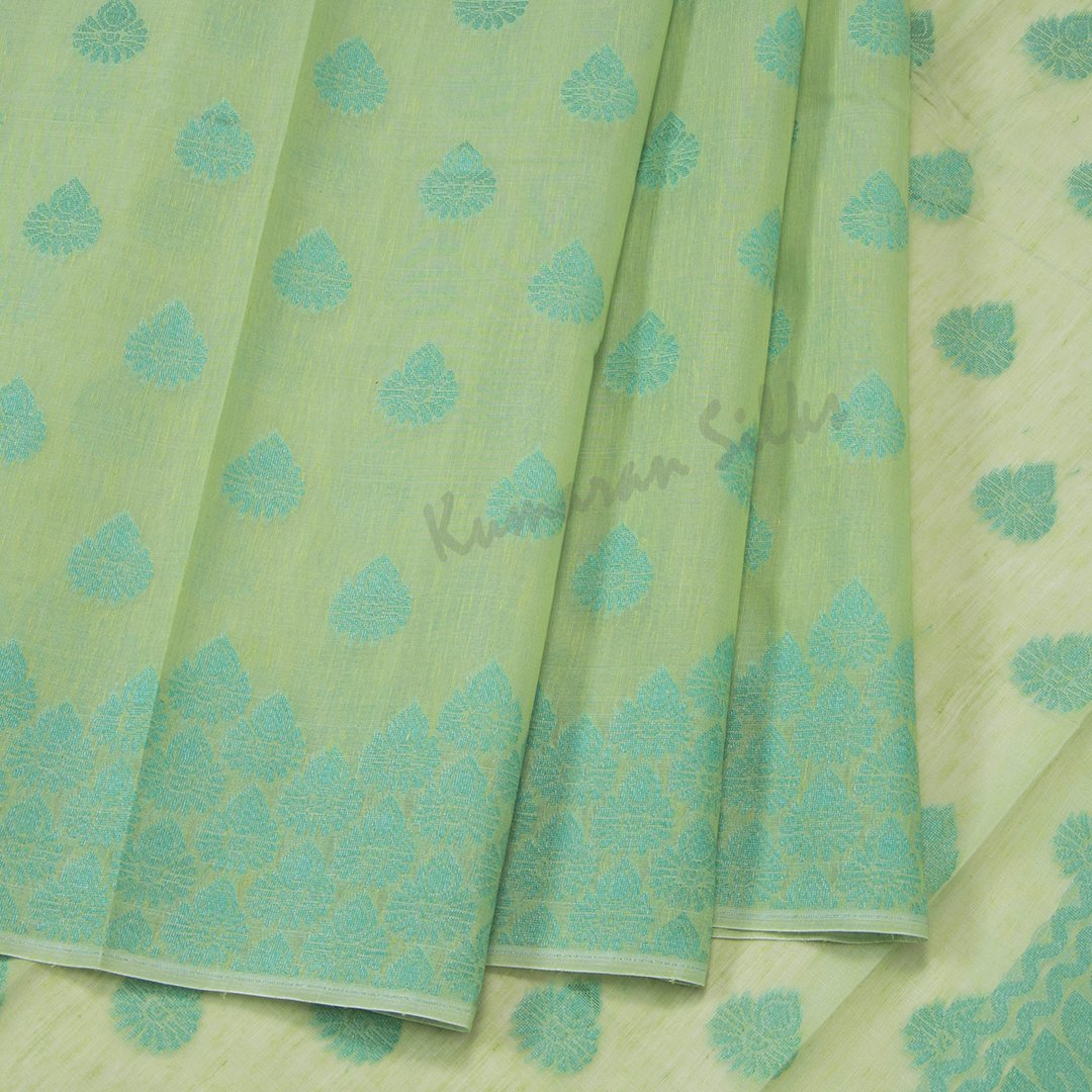 Silk Cotton Light Green Embossed Saree With Floral Buttas