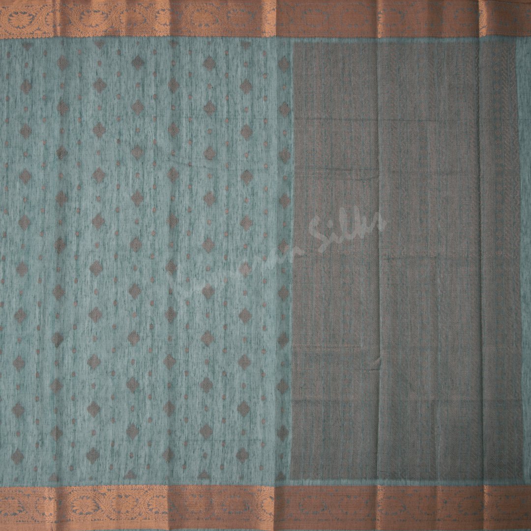Silk Cotton Shot Colour Embossed Saree With Diamond Shaped Buttas