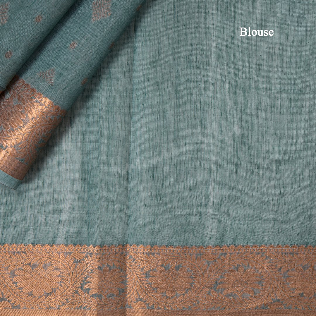 Silk Cotton Shot Colour Embossed Saree With Diamond Shaped Buttas