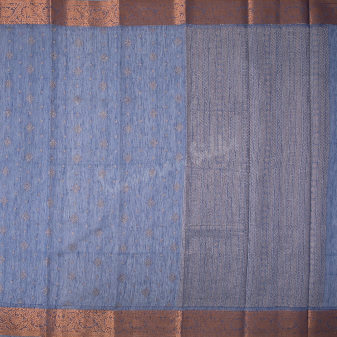 Silk Cotton Baby Blue Embossed Saree With Diamond Shaped Buttas