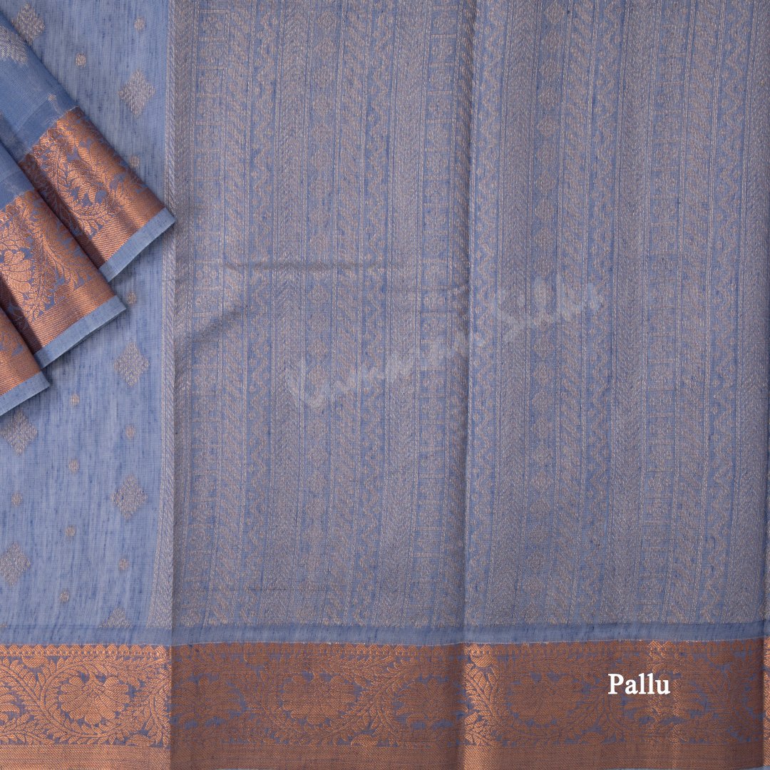 Silk Cotton Baby Blue Embossed Saree With Diamond Shaped Buttas