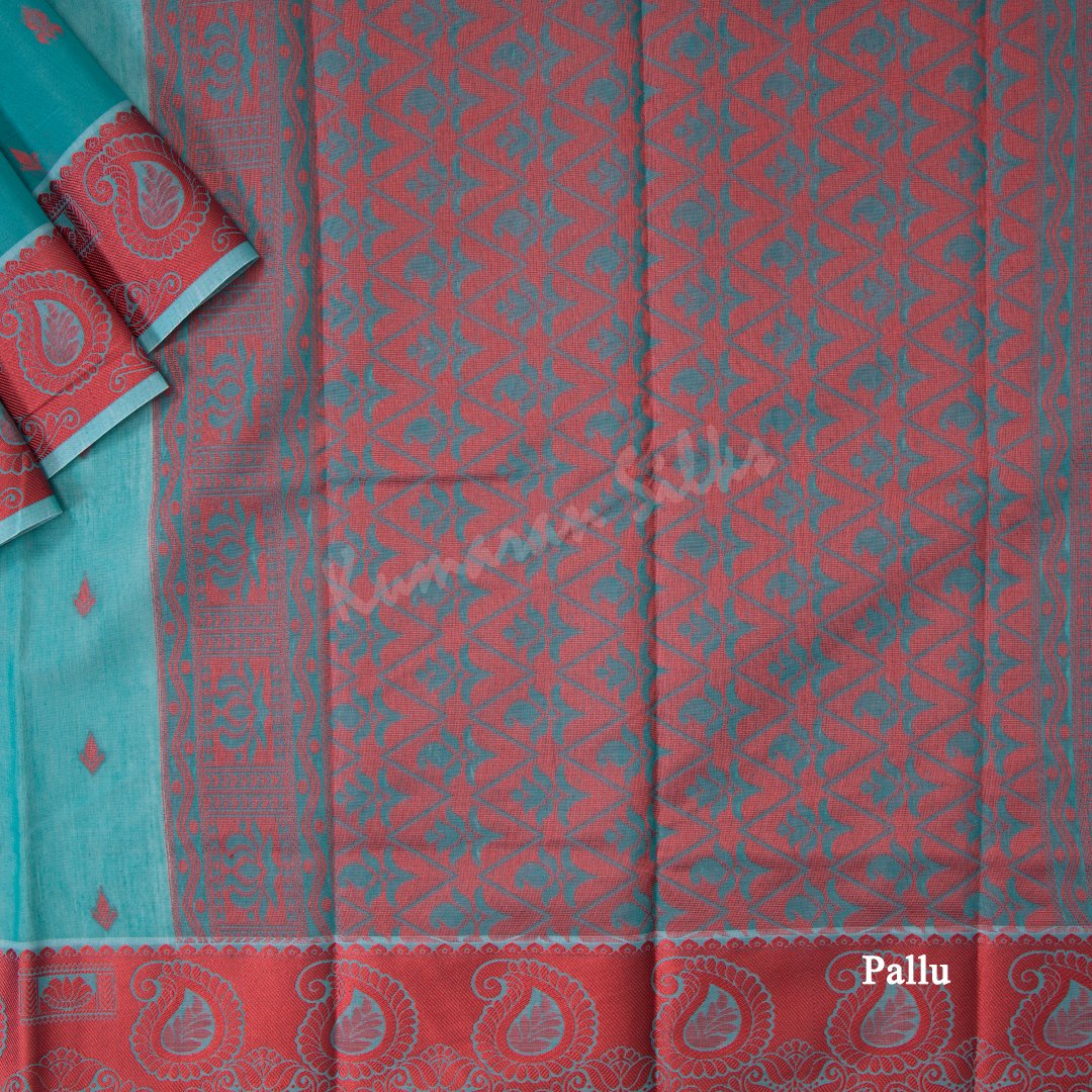 Silk Cotton Teal Blue Embossed Saree With Small Buttas And Red Border