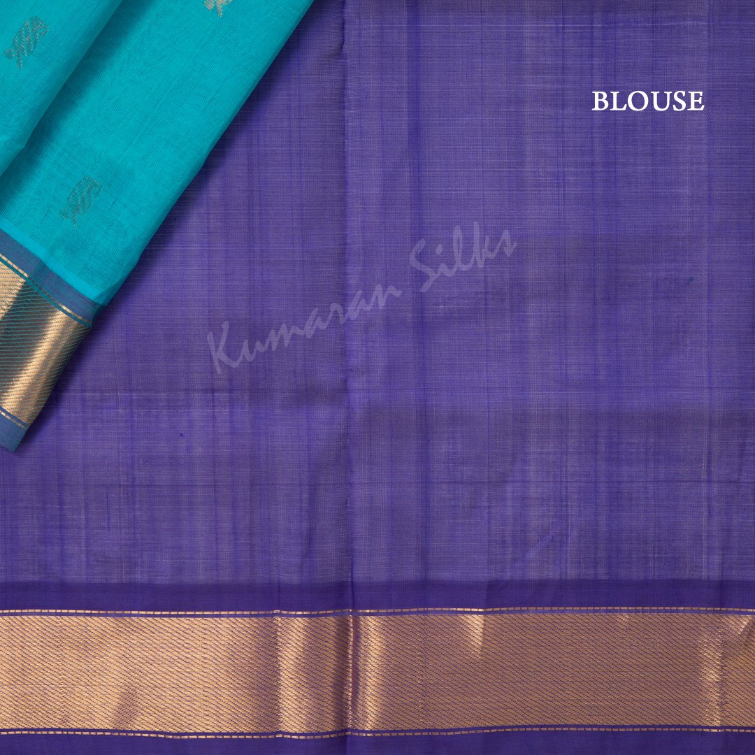 Amirthavarshini Silk Cotton Turquoise Saree With Small Buttas