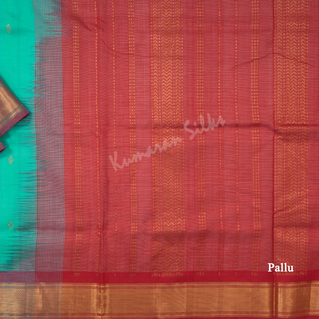 Amirthavarshini Silk Cotton Green Saree With Small Buttas