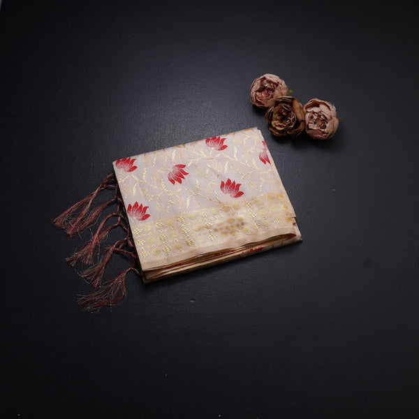 Semi Tussar Cream Floral Embossed Saree