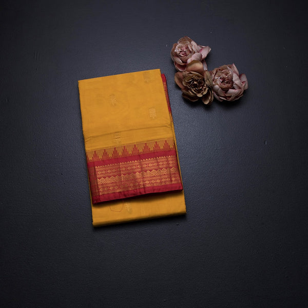 Gadwal Cotton Mango Yellow Saree With Zari Buttas And Temple Border Without Blouse 02