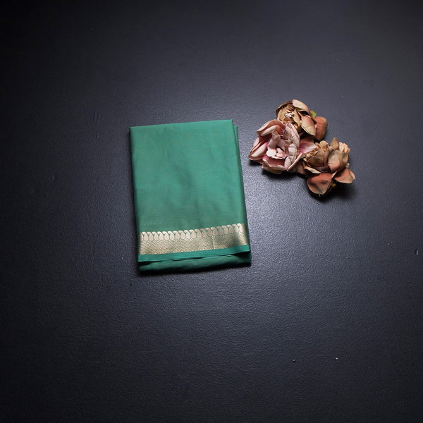 Semi Mysore Silk Pista Green Plain Saree And Zari Border
