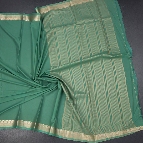 Semi Mysore Silk Pista Green Plain Saree And Zari Border