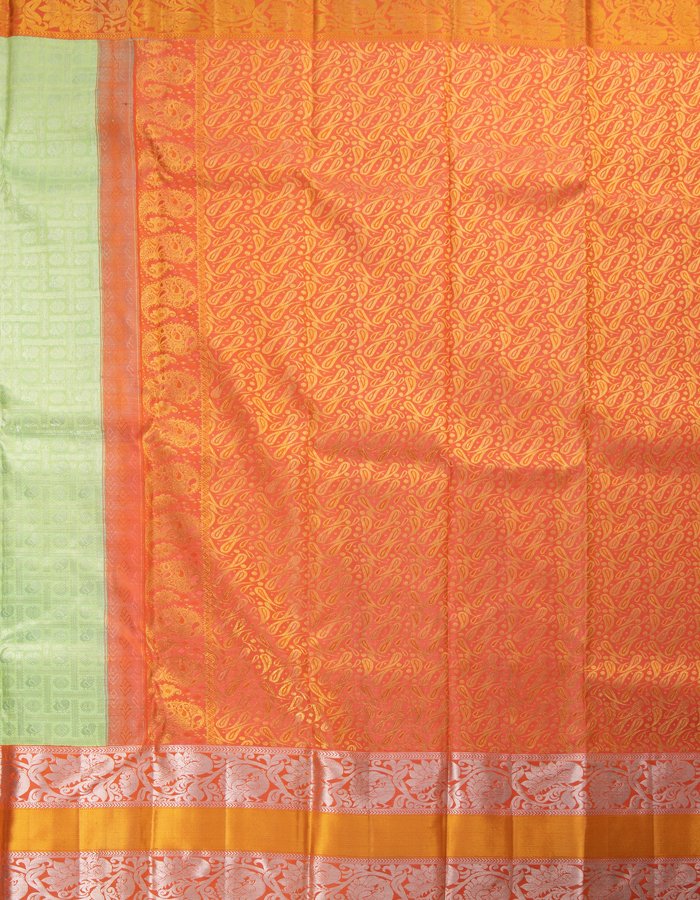 Light Green Self Designed Silk Saree With Orange Border And Gold And Silver Zari Work