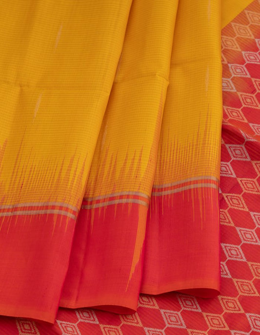 Yellow Soft Silk Saree With Golden And Silver Zari Diamond Shaped Motifs On Pallu