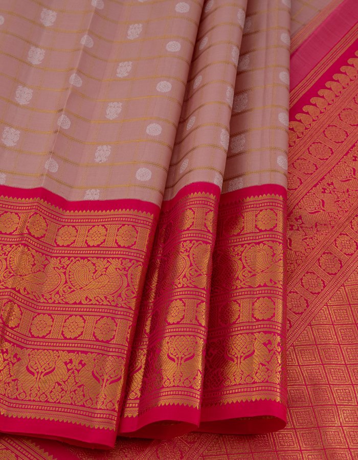 Pink Silk Saree With Peacock And Chakra Buttas On The Body With Yazhi Designed Red Border