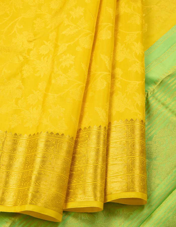 Yellow Brocade Silk Saree With Peacock And Yazhi Designed Border