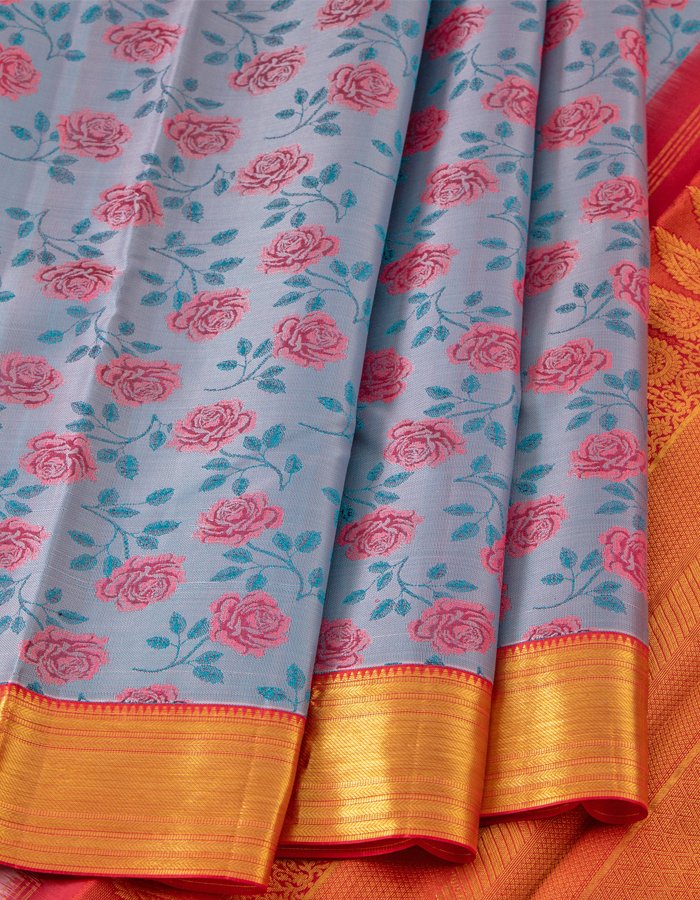 Greyish Blue Silk Saree With Floral Weaves And Pink Zari Border