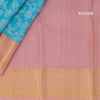 Blue Floral Brocade Silk Saree With Pink Zari Border - Kumaran Silks
