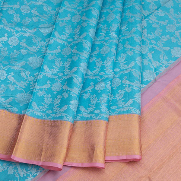 Blue Floral Brocade Silk Saree With Pink Zari Border - Kumaran Silks