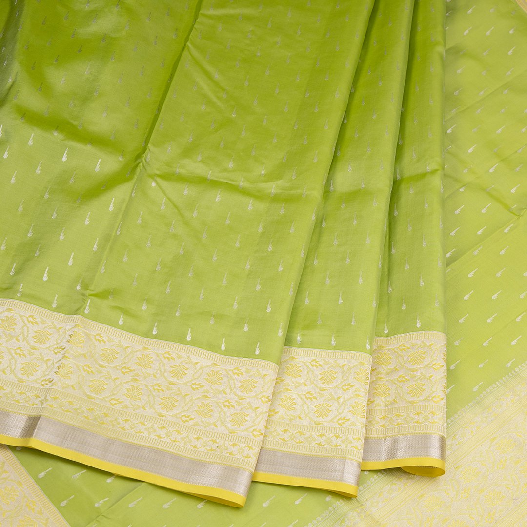 Light Green Soft Silk Saree With Silver Zari And Yellow Border