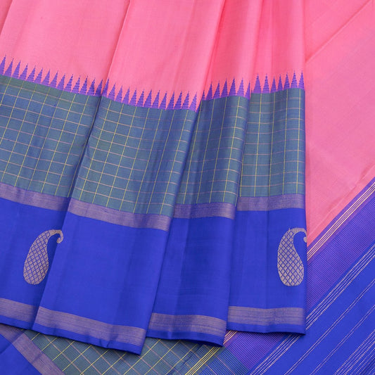 Plain Pink Silk Saree With Green Checked Temple Border Aligned On A Blue Border