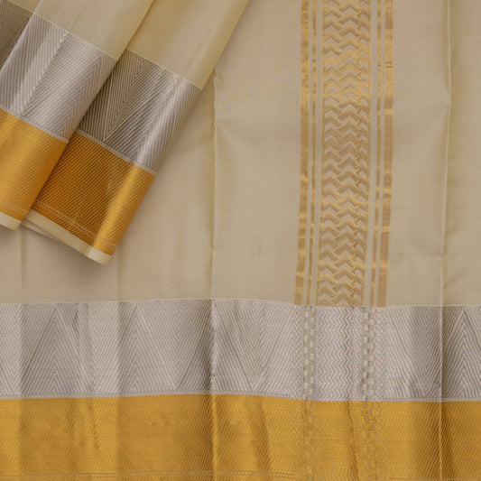 Designer silk dhoti with gold and silver zari border