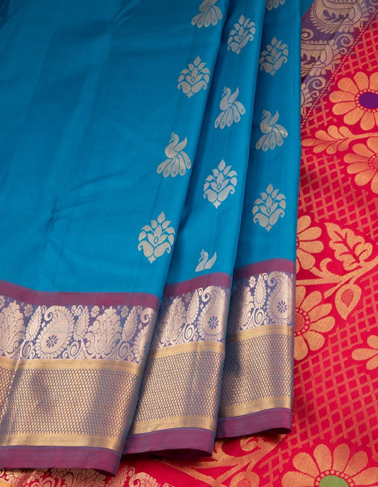 Blue Soft Silk Saree With Floral And Peacock Motifs In Silver Zari