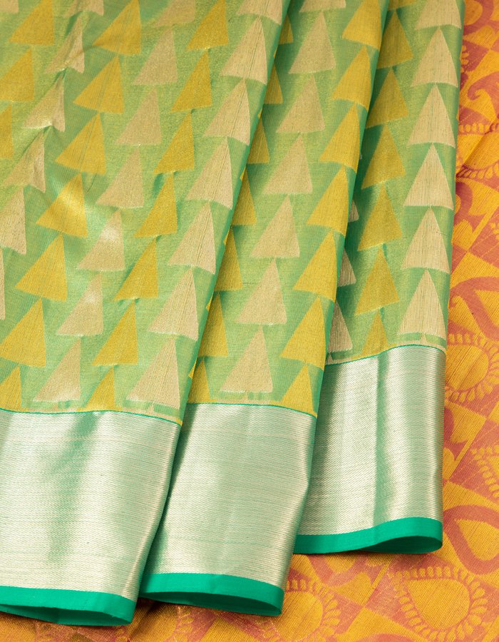 Green Tissue Silk Saree With Triangle Patterns In Gold And Silver Zari