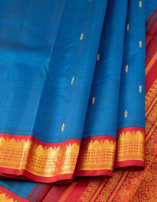 Dark Blue Silk Saree With Tiny Buttis And Red Border