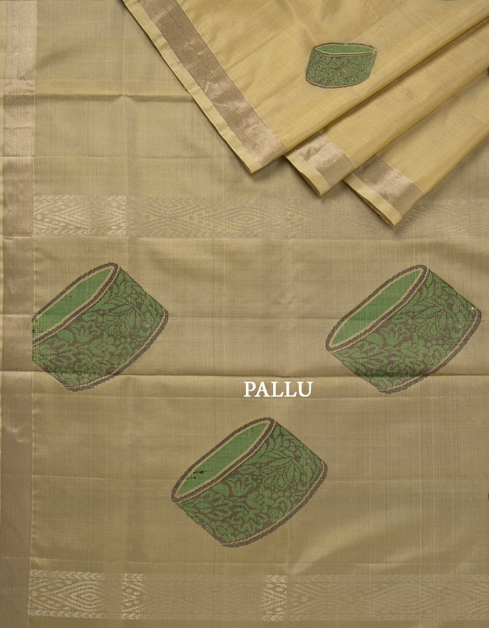 Beige Soft Silk Saree With Green Instrument Patterned Thread Work