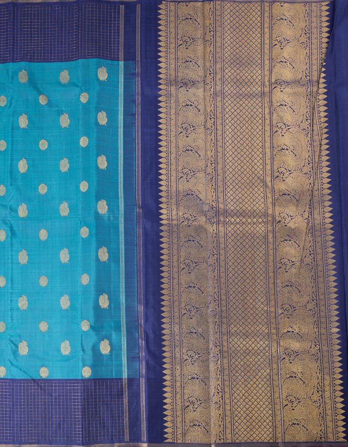 Blue Silk Saree With Zari Buttis And Dark Blue Checked Border